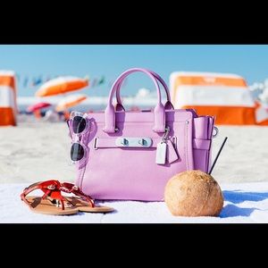 Coach swagger 33 in puce color